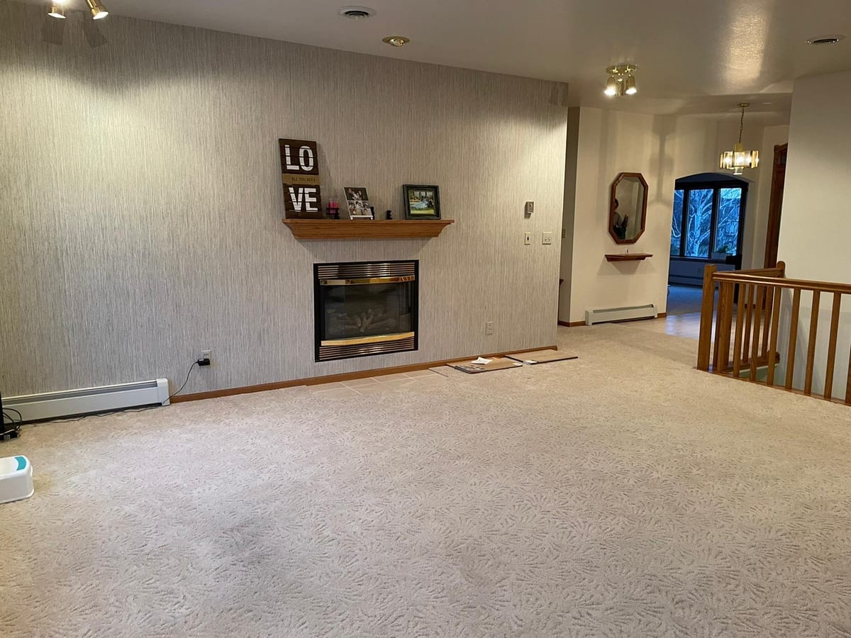 Living room with fireplace before the project, Montana, USA